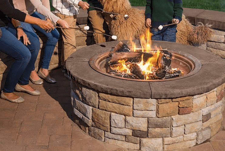 People Gathered around a firepit